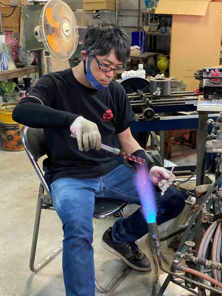 ペン軸を熱する神さん